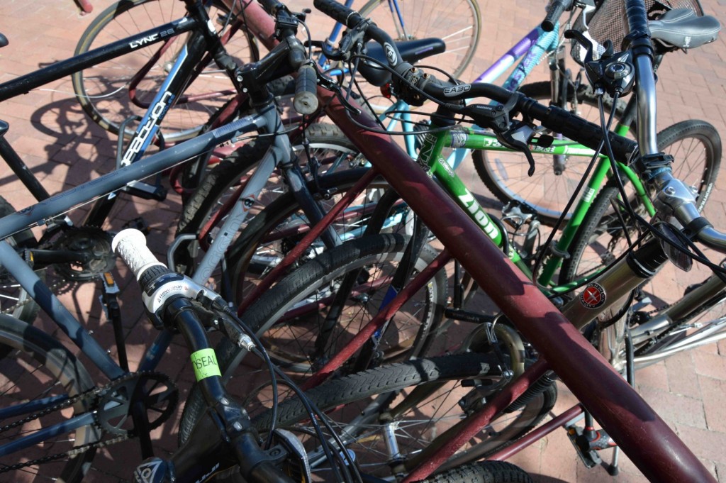 Bikes fill a rack on the DU campus. Photo by Connor W. Davis.