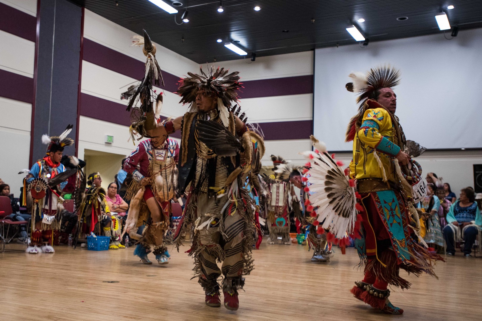 Dancers perform at the Pow Wow. Photo by Gusto Kubiak | Clarion