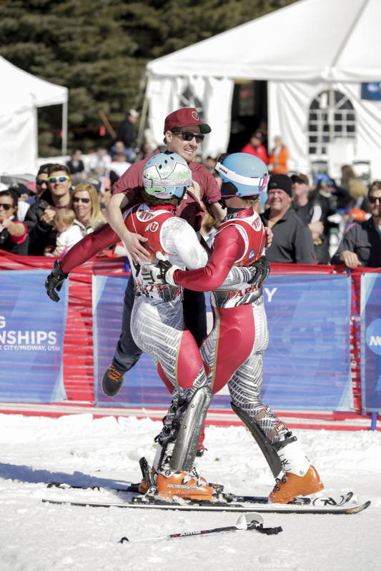 Skiiers embrace after winning at the NCAA Championships on March 8. It was DU's 22nd championship.